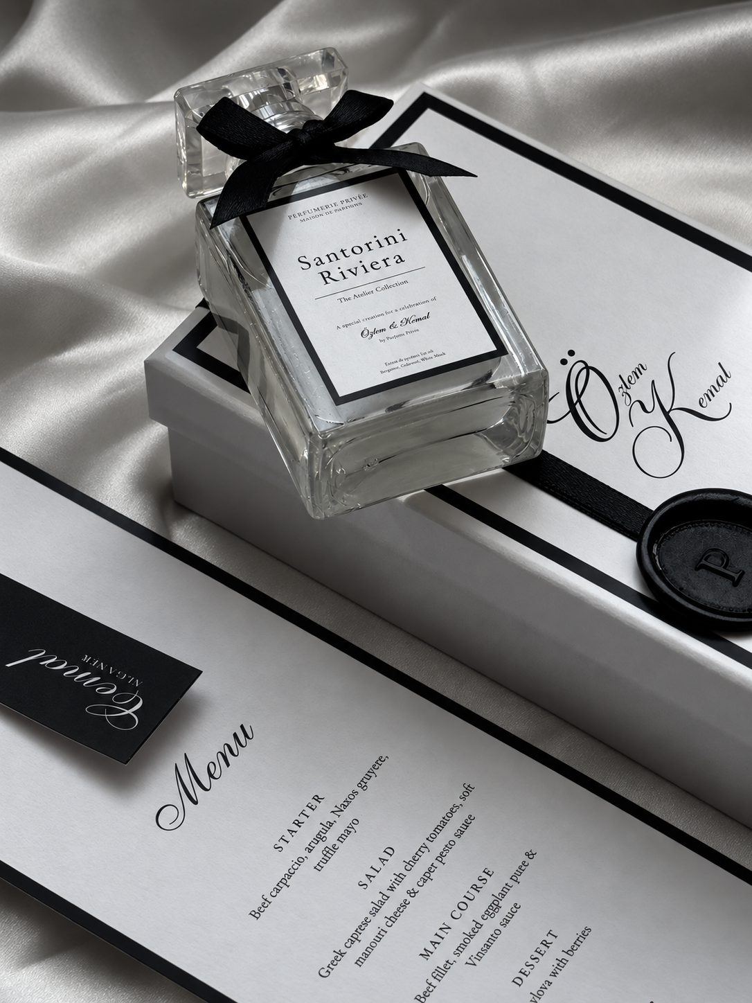 The Signature Fragrance, a bespoke wedding fragrance favour with custom label, gift box, black satin ribbon and wax seal