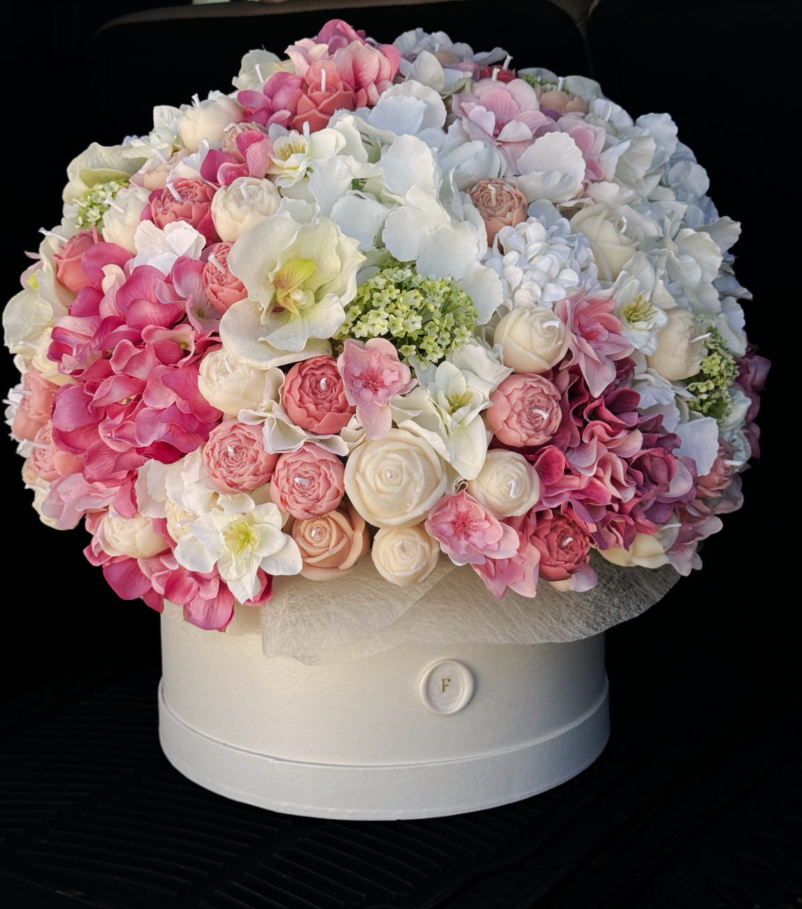 Rosé Héritage, a grand candle bouquet of approximately 150 blush pink and ivory olive wax flowers