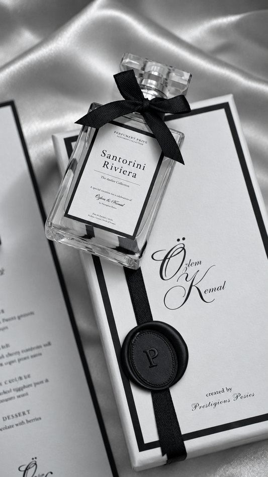 The Signature Fragrance, a bespoke wedding fragrance favour with custom label, gift box, black satin ribbon and wax seal