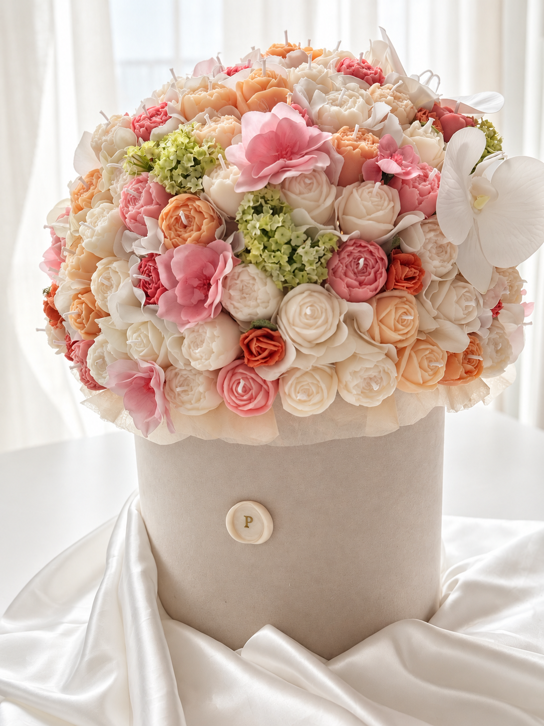 Rosé Héritage, a grand candle bouquet of approximately 150 blush pink and ivory olive wax flowers