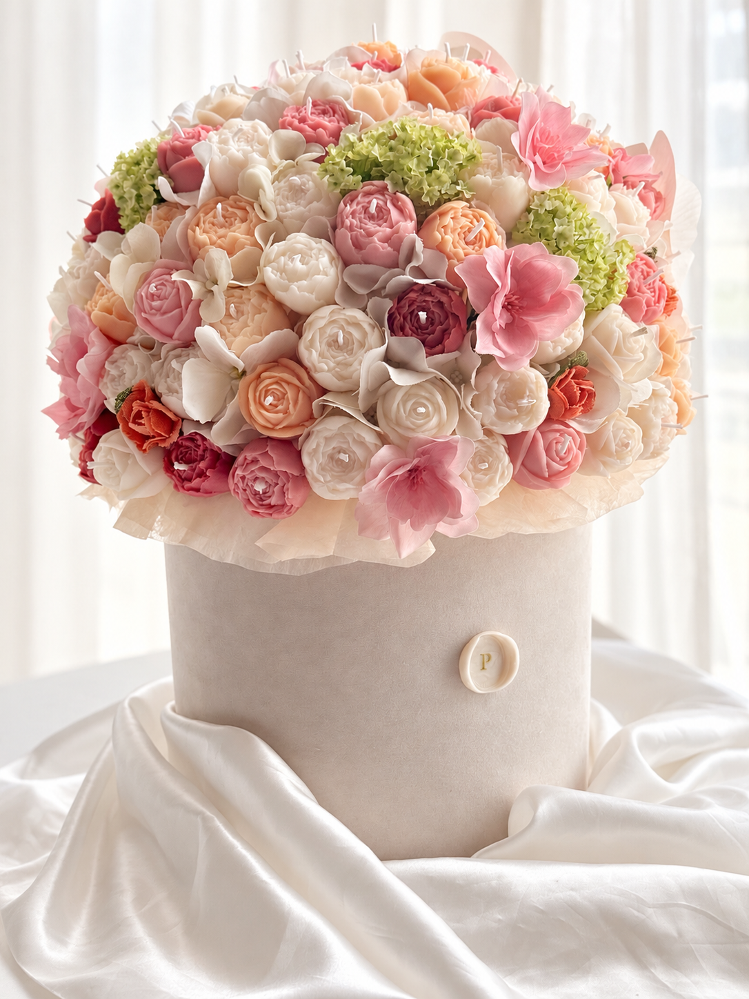 Rosé Héritage, a grand candle bouquet of approximately 150 blush pink and ivory olive wax flowers